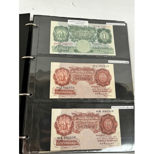 331 - An album of United Kingdom banknotes, including 2 white £5 notes, £1 notes from circa 1930, 1940, 19... 