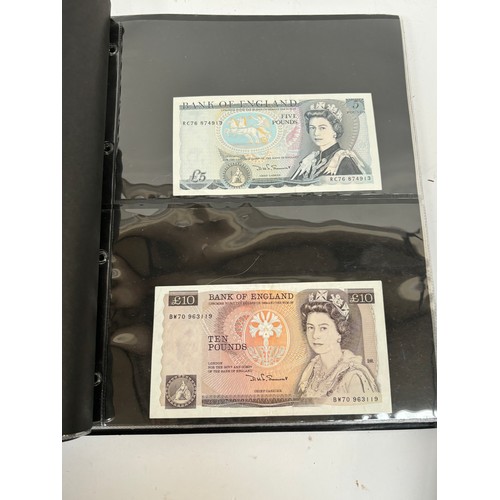 331 - An album of United Kingdom banknotes, including 2 white £5 notes, £1 notes from circa 1930, 1940, 19... 