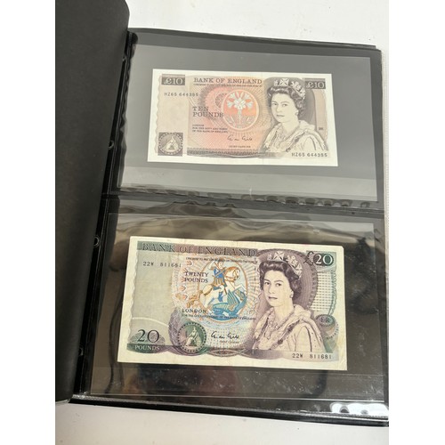 331 - An album of United Kingdom banknotes, including 2 white £5 notes, £1 notes from circa 1930, 1940, 19... 