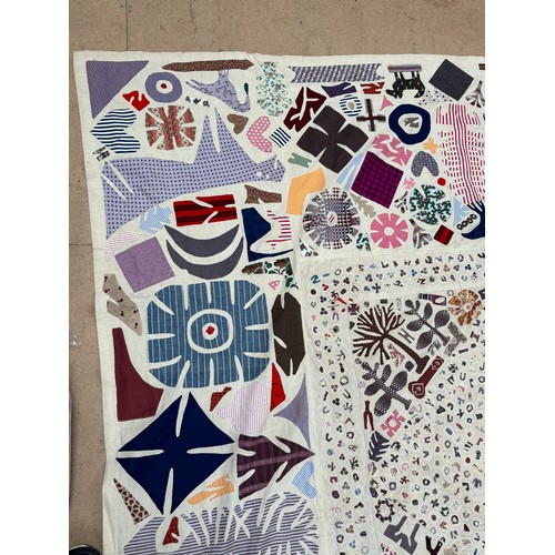 376 - A World War I patchwork quilt, floral decoration and frilled outer edge, 230cm x 240cm, a second mid... 