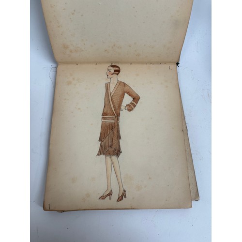 1005 - An album Circa 1927 showing a selection of ladies fashions, drawing/watercolours