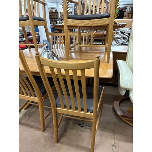 2044 - ERCOL - a model 1193 Windsor draw-leaf dining table. 150x73x92cm (extending to 200cm), current RRP £... 