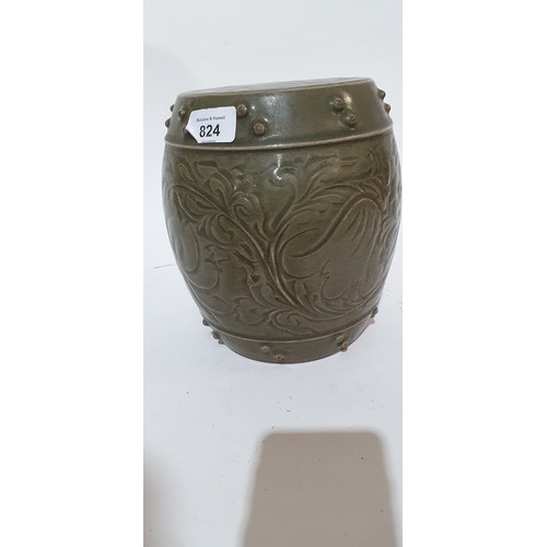 824 - Oriental incised and green glazed terracotta barrel design stand, H20cm