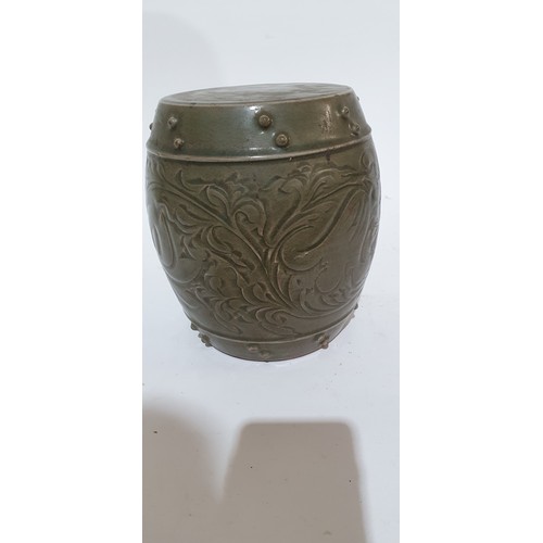 824 - Oriental incised and green glazed terracotta barrel design stand, H20cm