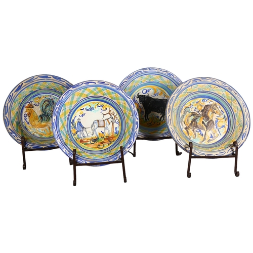 413 - A massive set of 4 Spanish faience pottery bowls, with painted animals, diameter 73cm, on wrought-ir... 