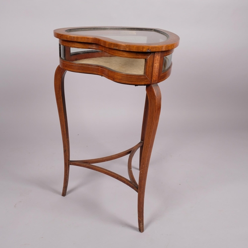 107 - An Edwardian mahogany heart-shaped vitrine table, with inlaid scroll marquetry, curved glass side pa... 