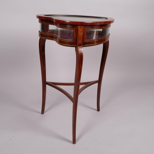 108 - An Edwardian mahogany heart-shaped vitrine table, with inlaid stringing, curved side panels, on shap... 