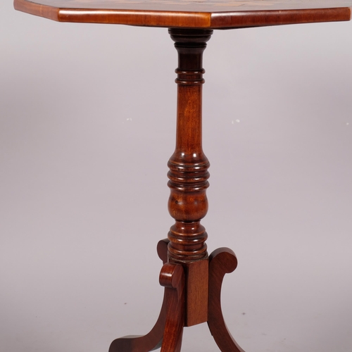 110 - A 19th century mahogany octagonal games top table, on tripod base, width 44.5cm, height 73cm.