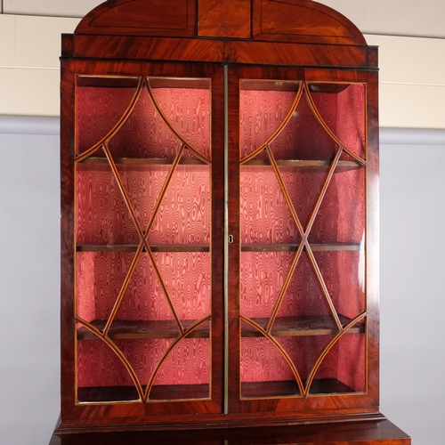 120 - Early 19th century mahogany secretaire library bookcase on chest, with strung lattice glazed doors, ... 