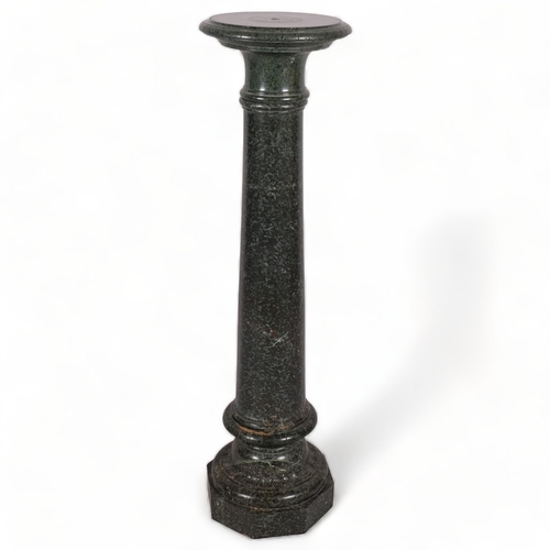 121 - 19th century green marble column on carved base, height 112cm, top diameter 29cm