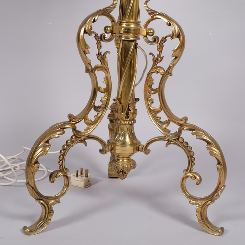 124 - A 19th century gilt-brass standard lamp with onyx table section, on acanthus tripod base, converted ... 