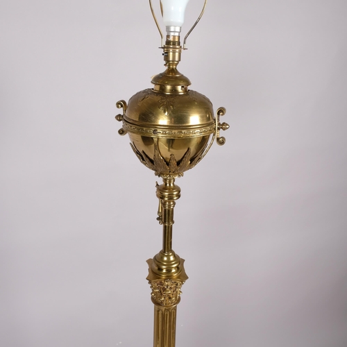 125 - 19th century brass and oak Corinthian column standard lamp, converted to electric, on stepped oak br... 