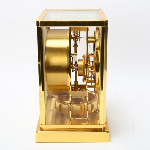 127 - JAGER LECOULTRE - Atmos clock, circa 1975, height 22cm, boxed with papers and service receipt dated ... 