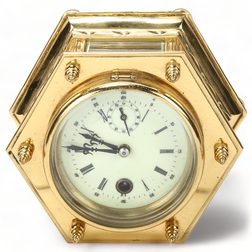 130 - An octagonal brass-cased table clock, probably mid-20th century, with enamel dial and 8-day movement... 