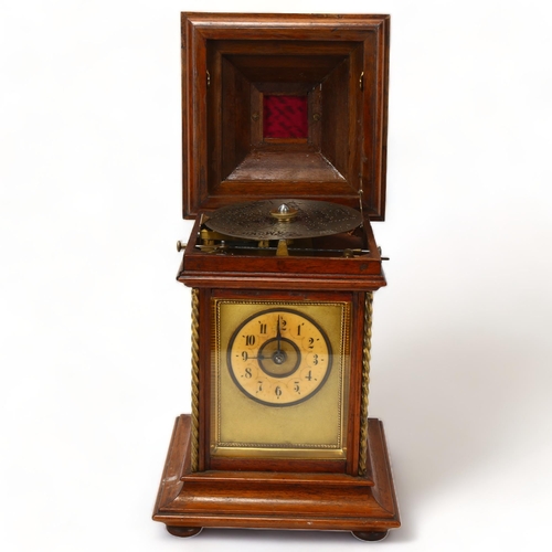 133 - 19th century German walnut-cased Symphonion musical mantel clock, hinged lid enclosing disc player p... 