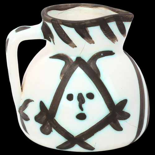 148 - Pablo Picasso (1881 - 1973), Tetes, Madoura pottery jug, conceived in 1953 in an edition of 500, imp... 