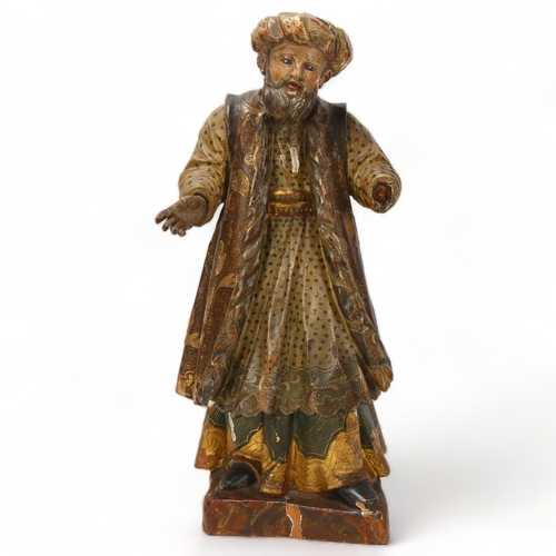 150 - An 18th Century Italian carved and painted wood figure of standing wise man, height 45cm