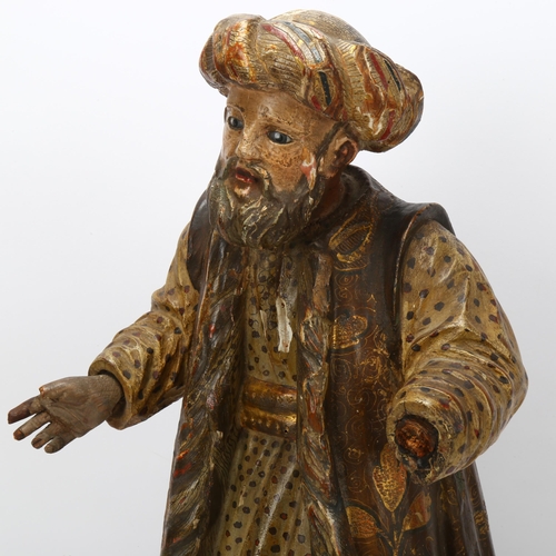 150 - An 18th Century Italian carved and painted wood figure of standing wise man, height 45cm