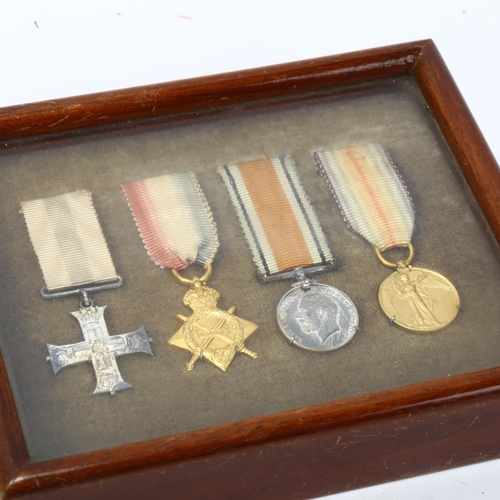 155 - A Military Cross group of 4 Great War miniature medals, mounted in Spink & Son glazed mahogany frame... 