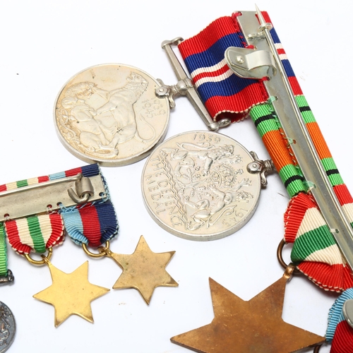 158 - A group of 4 Second War Service medals and miniatures