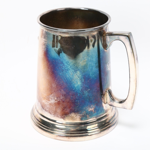 173 - A plated pint mug with military insignia