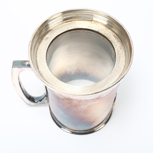 173 - A plated pint mug with military insignia