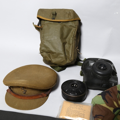 184 - Military uniform, photograph album, camouflage belts and cap of RH Rigg, circa 1960s