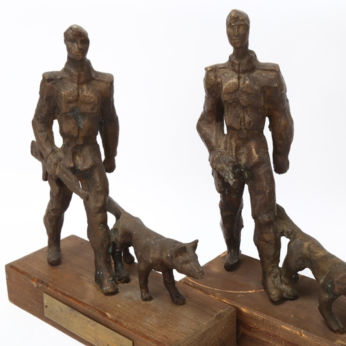 190 - Mid-20th century European School, 2 bronze sculptures of soldiers with dogs, mounted on woodblock ba... 