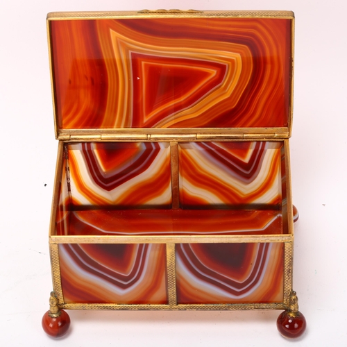 196 - A large 19th century polished agate and gilt-metal casket, on agate ball feet, 11cm x 7cm x 7cm