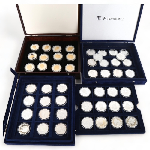 212 - A collection of 50 modern silver one ounce commemorative coins (50oz total)