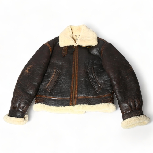 250 - A good quality pilot aviator style jacket, brown leather and fleece-lined, size small/medium