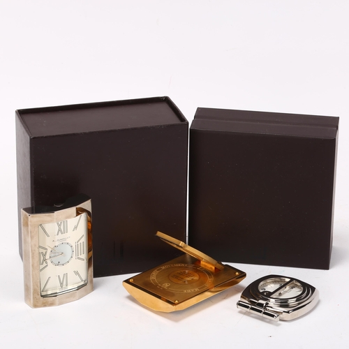 259 - DUNHILL - quartz travelling clock, in stainless steel case, height 7cm, boxed, together with 2 other... 