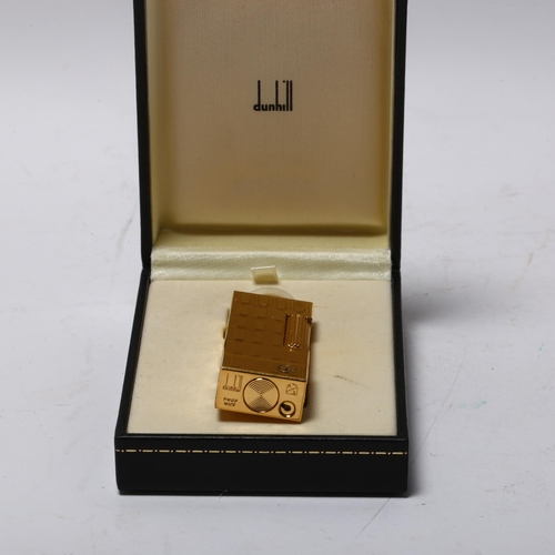 260 - DUNHILL - gold plated pocket lighter, length 64mm, boxed with papers