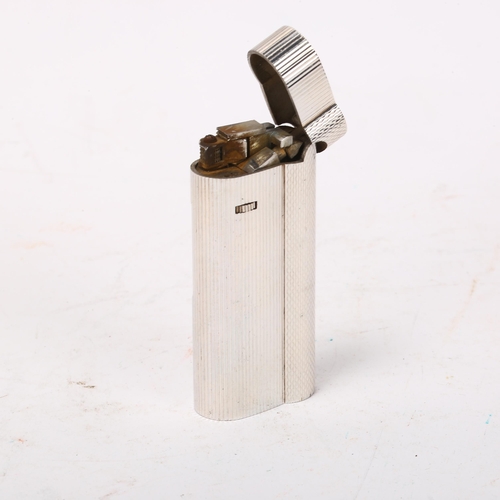 261 - DUNHILL - silver plated pocket lighter, length 65mm, boxed with papers