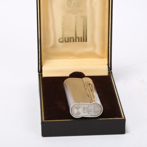 261 - DUNHILL - silver plated pocket lighter, length 65mm, boxed with papers