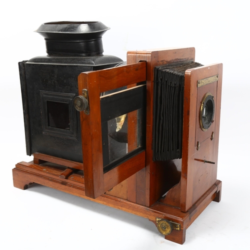 284 - A Victorian mahogany and brass-mounted tinplate magic lantern, base length 49cm