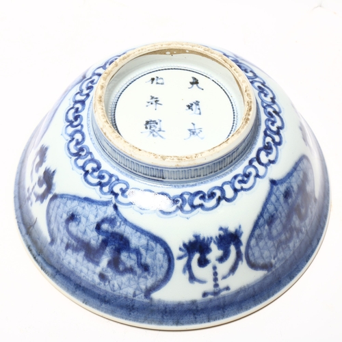 335 - A Chinese blue and white porcelain bowl, hand painted figures in gardens, 6 character mark, diameter... 