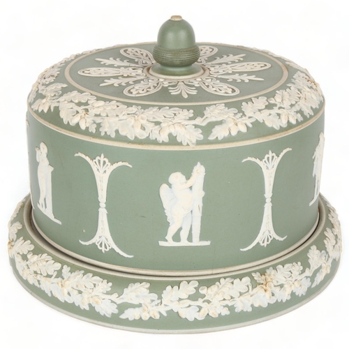 67 - 19th century pale green Jasperware Stilton dish and cover, with acorn handle, diameter 26cm