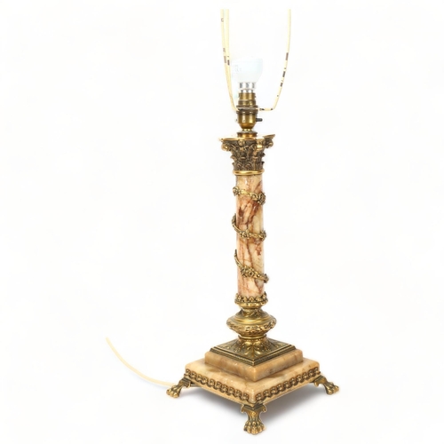 81 - Early 20th century gilt-bronze and alabaster Neoclassical design table lamp, on lion paw feet, heigh... 