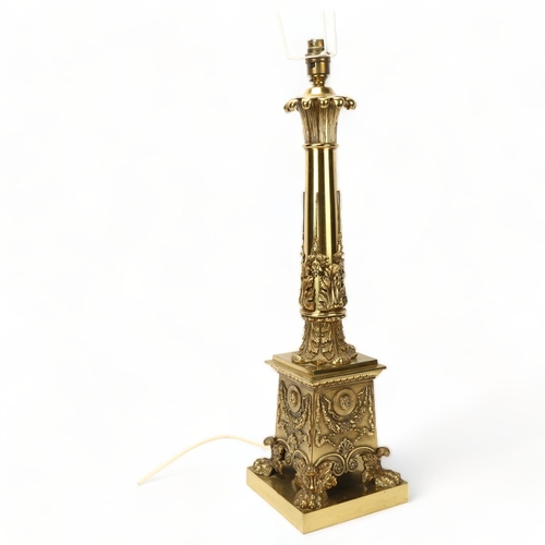 82 - 19th century gilt-bronze Neoclassical design table lamp, with relief cast decoration on heavy lion p... 