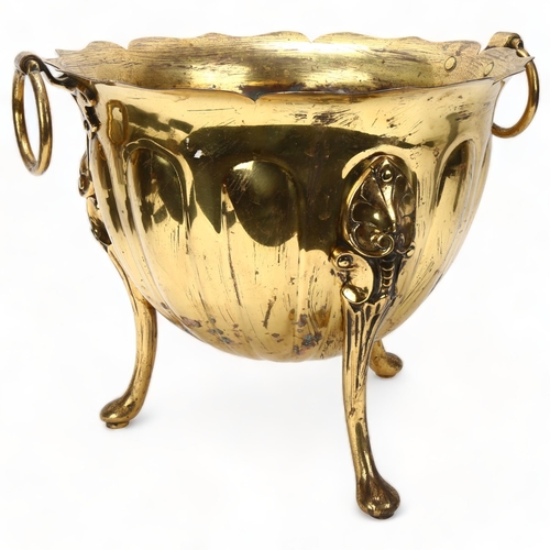 88 - A 19th century brass jardiniere, with ring handles on 3 cast feet, height 30cm, diameter 35cm exclud... 