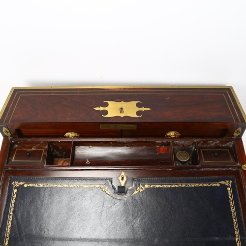 92 - An unusual 19th century brass-bound rosewood campaign travelling writing box, with rising drawer-fit... 