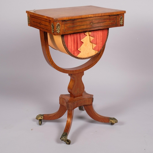 98 - Regency brass inlaid mahogany sewing table, with rising top, drawer below with yoke shaped support a... 