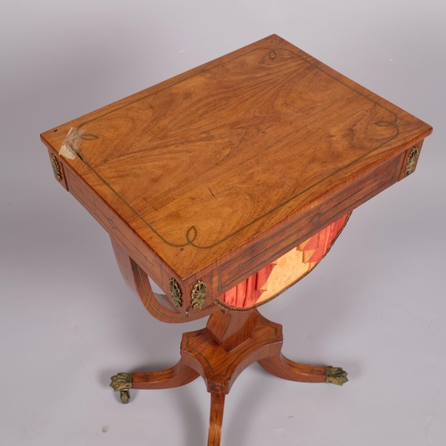 98 - Regency brass inlaid mahogany sewing table, with rising top, drawer below with yoke shaped support a... 