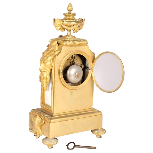 142 - Good quality 19th century French ormolu and alabaster Rococo style mantel clock, surmounted by an ur... 