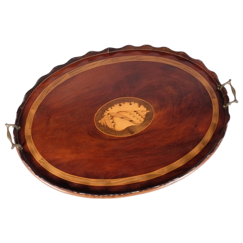 418 - A Georgian mahogany tray with inlay boxwood conch shell motif and brass handles, length 69cm