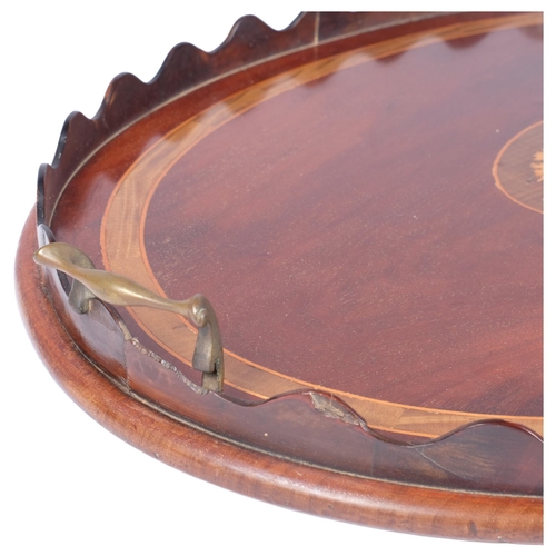 418 - A Georgian mahogany tray with inlay boxwood conch shell motif and brass handles, length 69cm