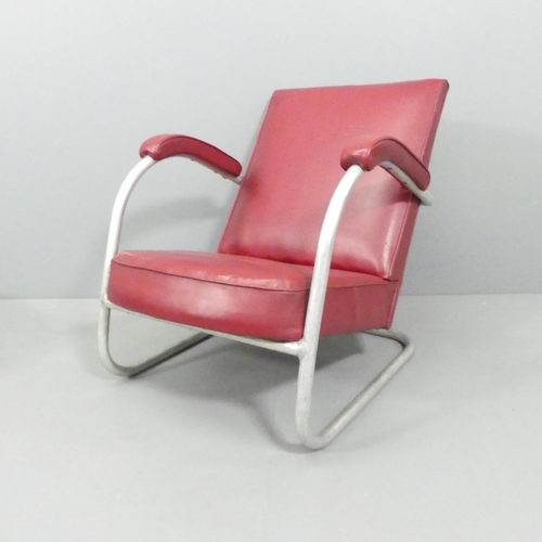 2046 - A mid-century modernist cantilever tubular steel lounge chair.