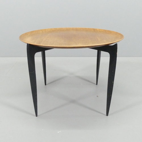FRITZ HANSEN - A mid-century Danish teak tray table on ebonised folding spiderleg base, marked "FH Made in Denmark" beneath. 60x43cm.