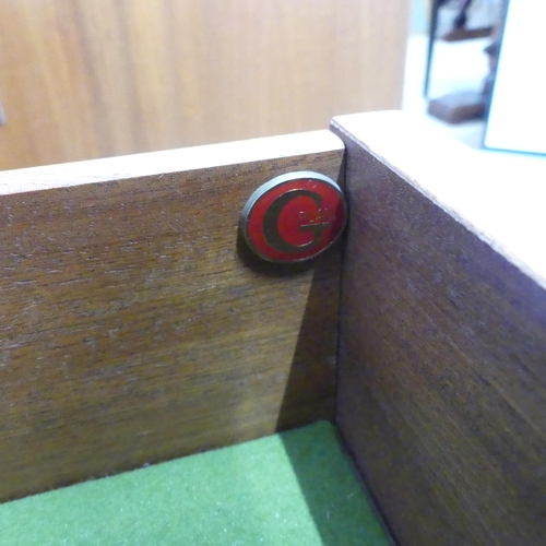 2010 - G-PLAN - A mid-century teak Plinth sideboard by Victor Wilkins, with single drawer above three cupbo... 